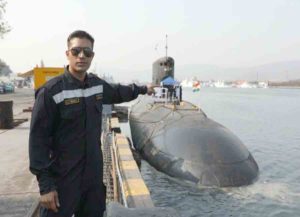 Harman in front of INS Sindhukirti